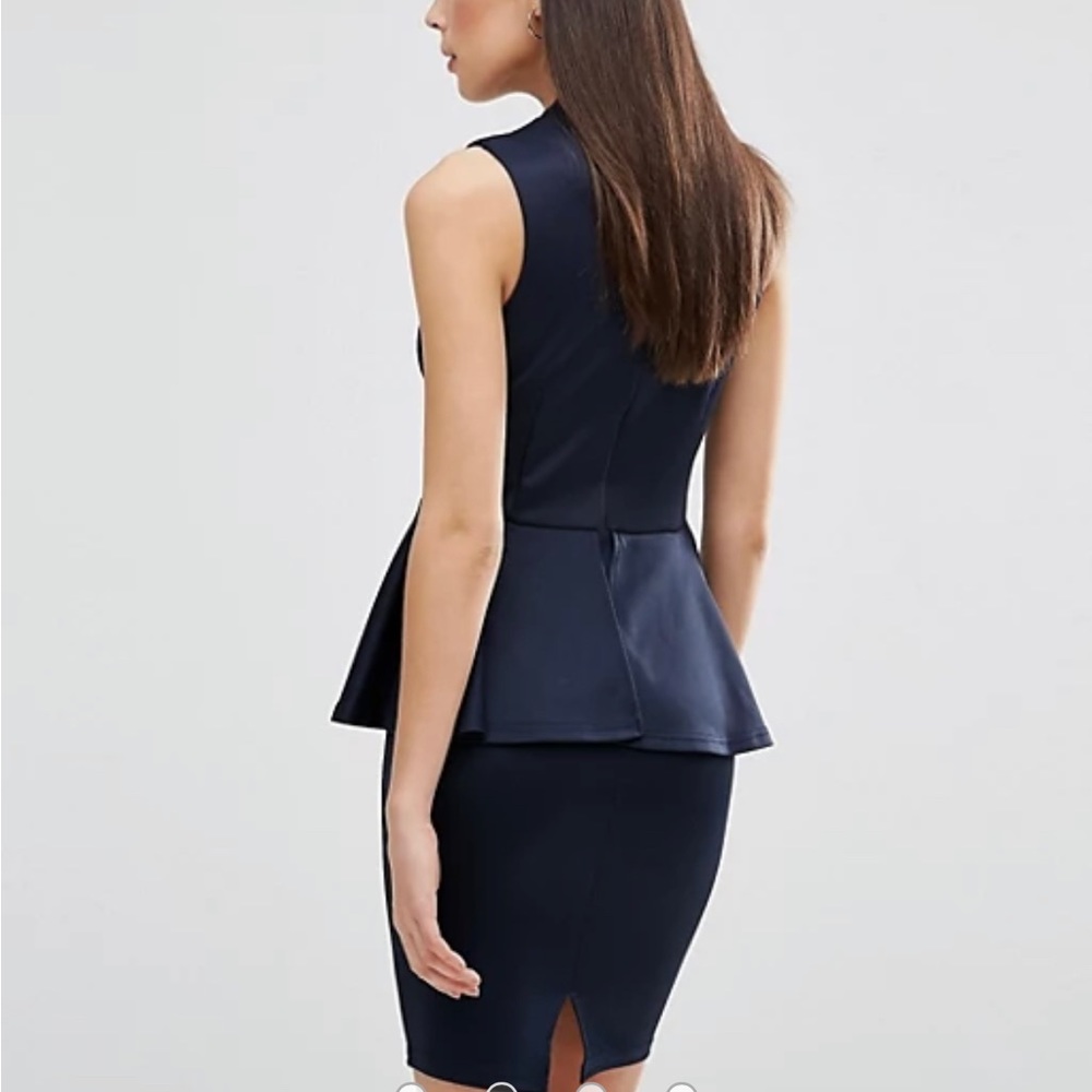 Bailey 44 Stretch Peplum with vegan Leather w/snake embossed skirt Size L